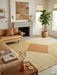8' x 8' Square Beige Orange Geometric Modern Area Rug styled in a warm contemporary living room with neutral furnishings and earthy décor.