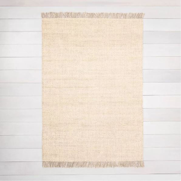 Size 7'x10' Color Beige Bleached Jute Fringe Rug - Hearth & Hand™ with Magnolia