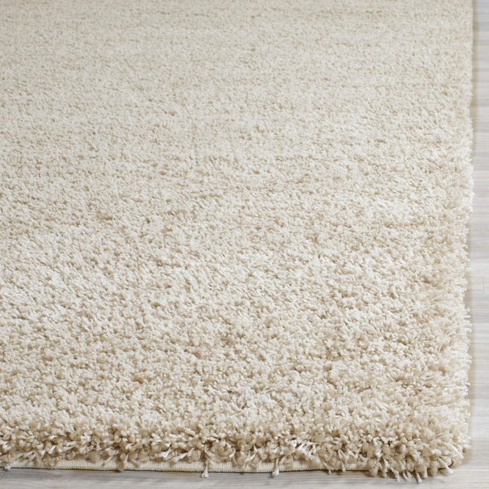 SAFAVIEH Santa Monica Shag Collection 6'7" x 9'6" Beige SGN725 Solid Non-Shedding Living Room Bedroom Dining Room Entryway Plush 2-inch Thick Area Rug