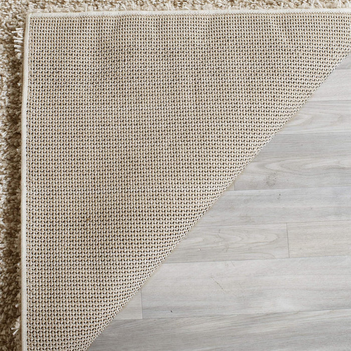 SAFAVIEH Santa Monica Shag Collection 6'7" x 9'6" Beige SGN725 Solid Non-Shedding Living Room Bedroom Dining Room Entryway Plush 2-inch Thick Area Rug