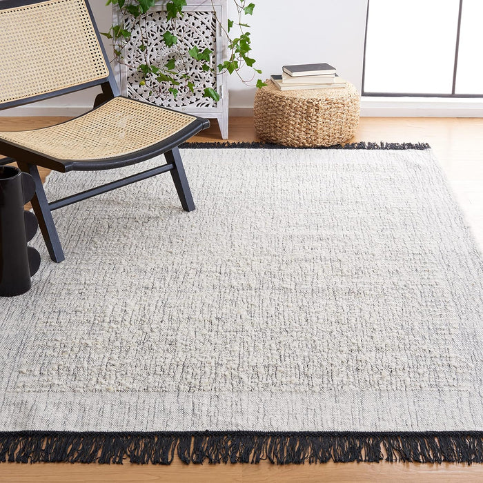 SAFAVIEH Natura Collection Area Rug - 8' x 10', Ivory & Black, Handmade Flat Weave Textured Fringe Cotton, Ideal for High Traffic Areas in Living Room, Bedroom (NAT930Z)