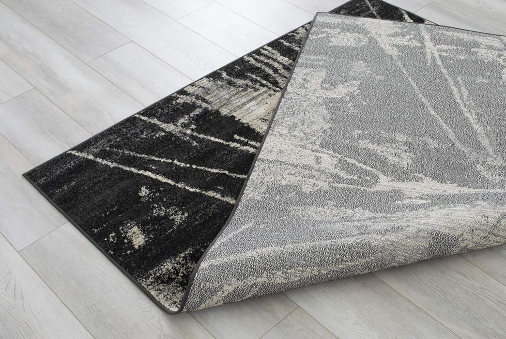 4' 11" x 7' 0" Charcoal Grey with Ivory Allstar Modern Accent Rug Abstract Weathered Splatter Design