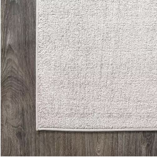 Haze Solid Low-Pile Ivory 5 ft. Round Area Rug
