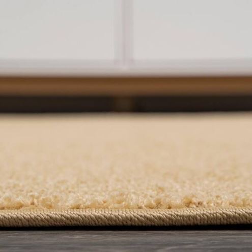 Haze Solid Low-Pile Mustard 5 ft. Round Area Rug