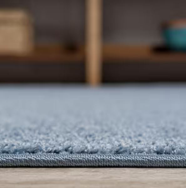 Haze Solid Low-Pile Classic Blue 8 ft. x 10 ft. Area Rug