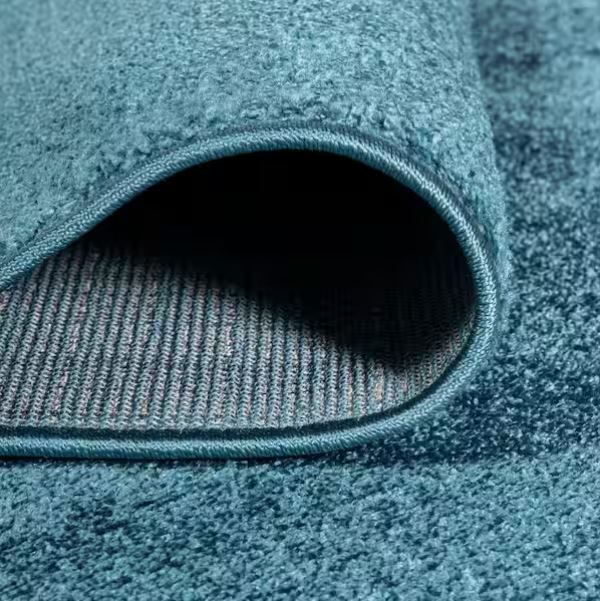 Haze Solid Low-Pile Turquoise 5 ft. x 8 ft. Area Rug