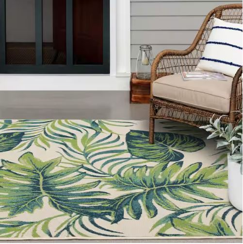Shop Labor Day Sale ❯ Backyard Bungalow Ivory/Multi 7 ft. 7 in. x 10 ft. Green Leaf Tropics Polypropylene Indoor/Outdoor Area Rug