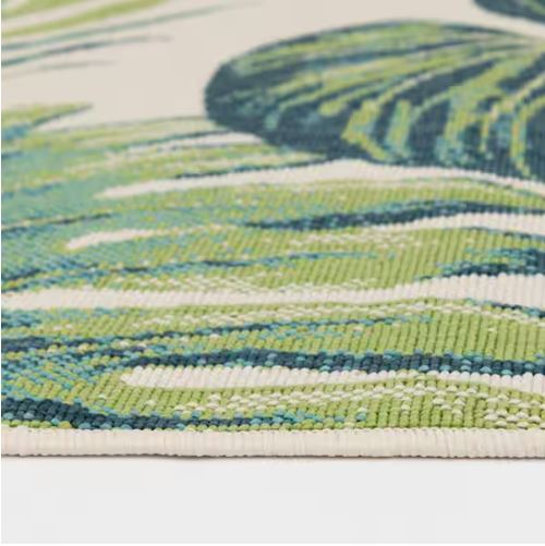 Shop Labor Day Sale ❯ Backyard Bungalow Ivory/Multi 7 ft. 7 in. x 10 ft. Green Leaf Tropics Polypropylene Indoor/Outdoor Area Rug