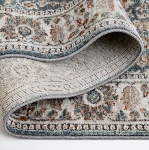 Reynell Light Blue 6 ft. x 9 ft. ft. Floral Traditional Area Rug